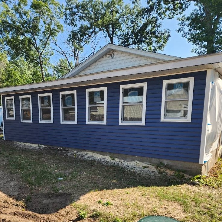Exterior window frames install general contractor — completed by 848 Property Services in Hastings, MI.