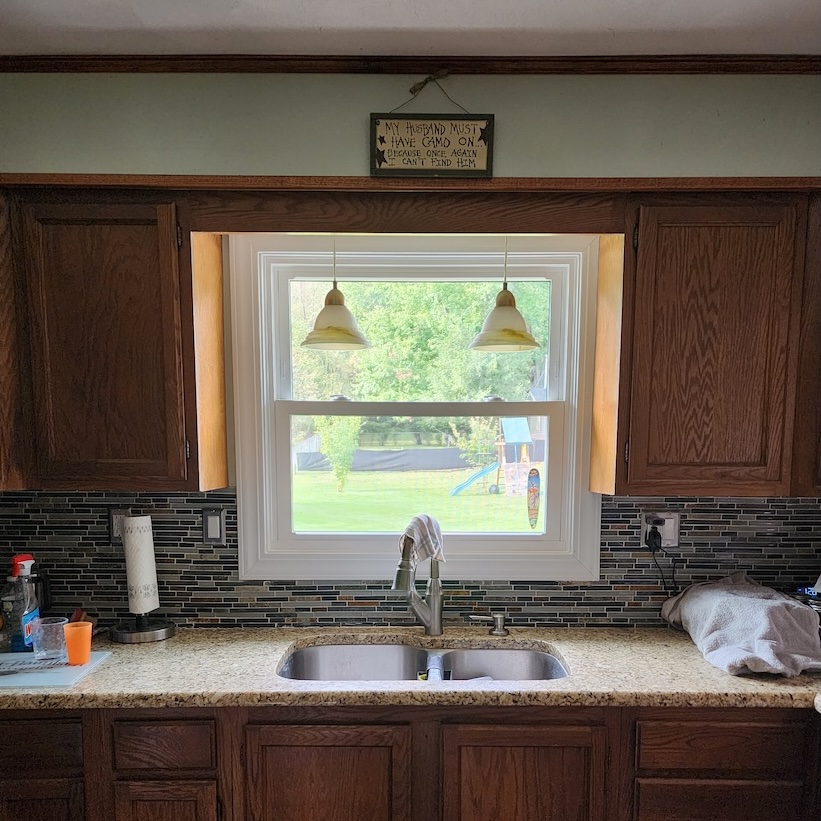 Interior white window frame replacement home remodel — completed by 848 Property Services in Hastings, MI.
