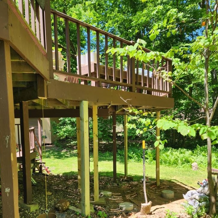 Exterior back patio deck remodel general contractor — completed by 848 Property Services in Hastings, MI.