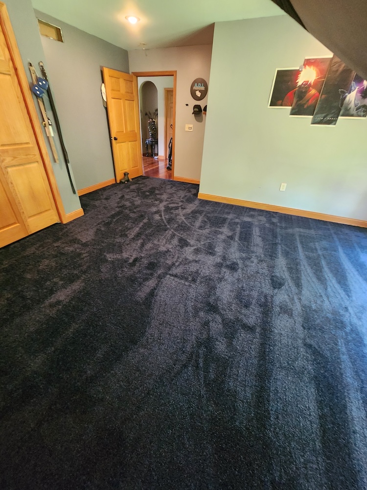 Interior new carpet new pad installation bedroom home remodel — completed by 848 Property Services in Hastings, MI.