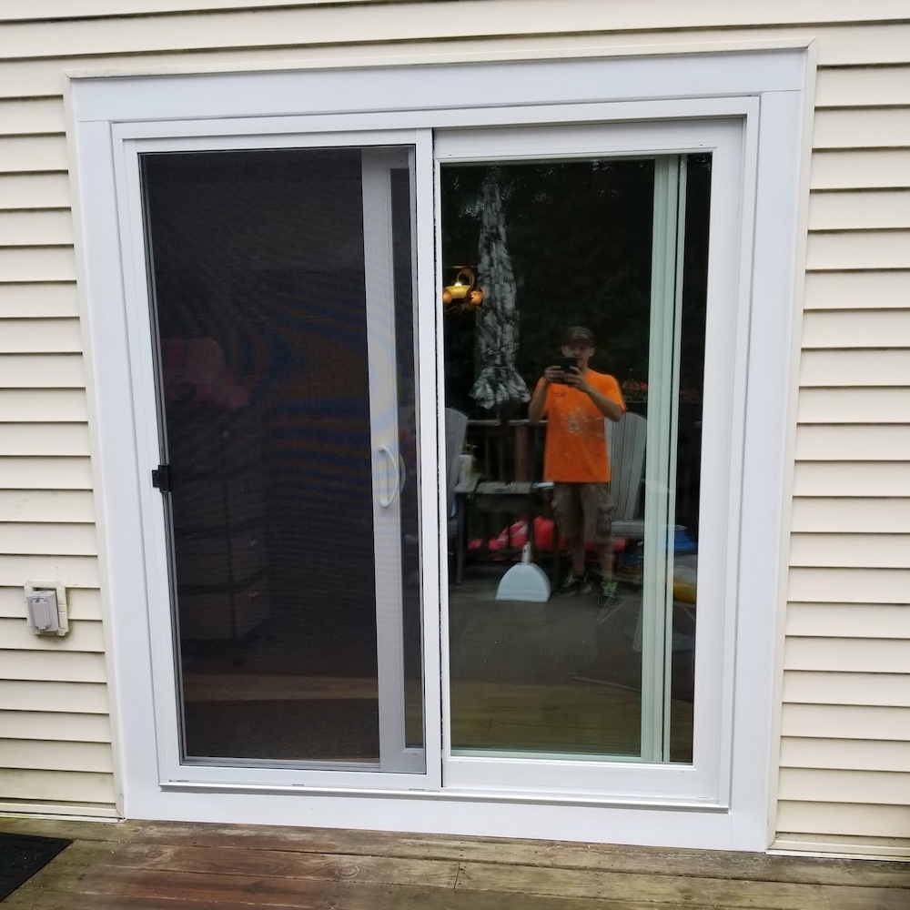 Exterior glass sliding door frame install general contractor — completed by 848 Property Services in Hastings, MI.