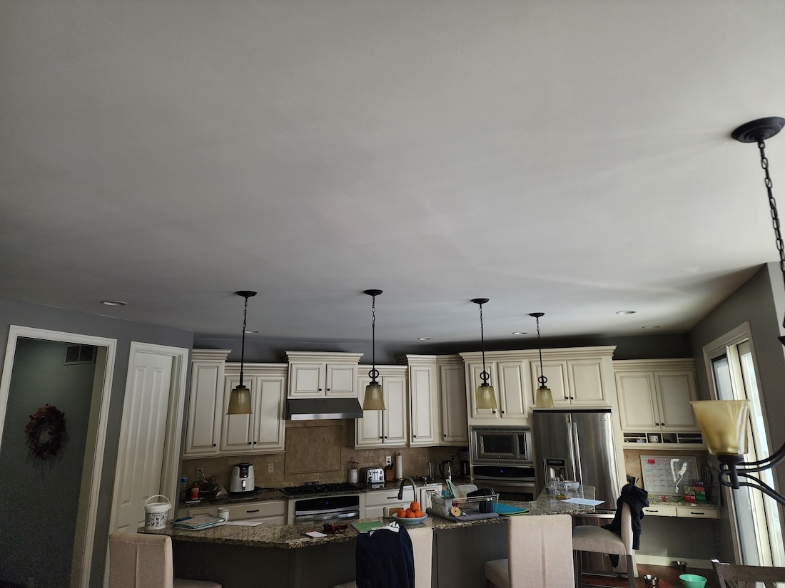Interior ceiling paint ceiling lighting home remodel — completed by 848 Property Services in Hastings, MI.